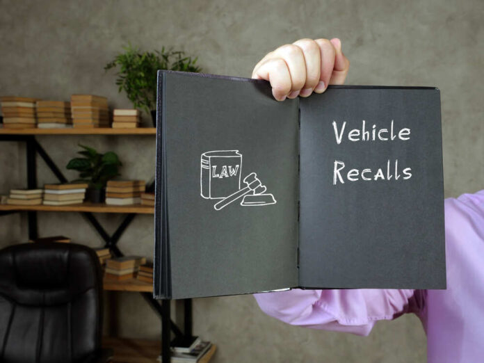 shutterstock_1894322659.jpg featured image Book with Vehicle Recalls and law symbol