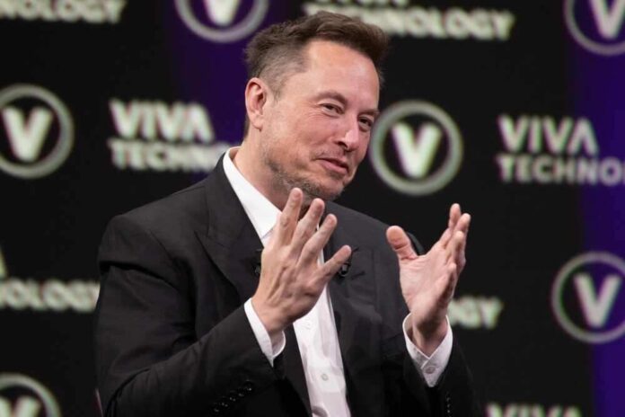 shutterstock_2318800315.jpg featured image Elon Musk on stage at Viva Technology conference.