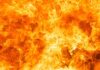 Bright orange and yellow flames burning intensely.