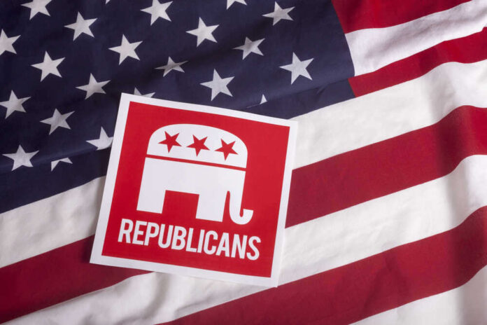 shutterstock_305852282.jpg featured image Republican party logo on American flag background.