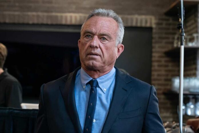 shutterstock_2456684687.jpg featured image Robert F Kennedy JR in suit indoors.