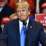 Trump Sends Another 2,000?! Donald Trump at a rally with supporters.