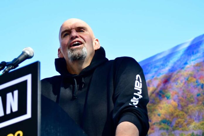 shutterstock_2213690401.jpg featured image John Fetterman speaking at podium.