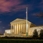 The United States Supreme Court building at dusk