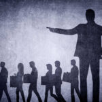Laid-off workers walking away