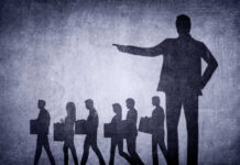 Laid-off workers walking away
