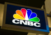 CNBC logo sign with peacock in color