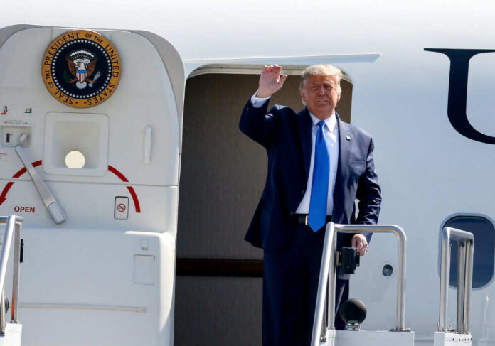 President Donald Trump stepping out of Air Force One