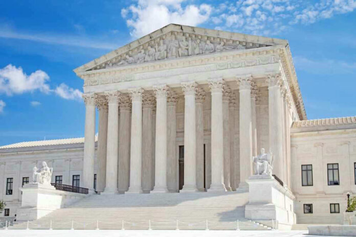 United States Supreme Court building with statues and columns
