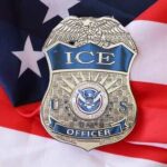 ICE Attacked: SHOCKING Anti-ICE Motive Revealed ICE officer badge placed on an American flag