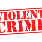 Halloween Bloodbath Stuns North Carolina Red stamp with the words VIOLENT CRIME