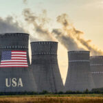 Cooling towers with USA flag and smoke clouds