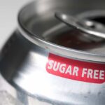 MASSIVE Diet Drink Deception Finally EXPOSED Close-up of a soda can with a 'sugar free' label