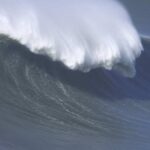 HORRIFYING Wave Tragedy Kills Two Large foamy wave rolling on the surface of a stormy ocean