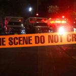 FOX News Anchor KILLS Mother — Halloween Horror Crime scene tape with emergency vehicles in background.