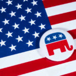 American flag and Republican Party elephant logo button.