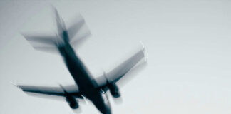 Airplane in flight with motion blur.