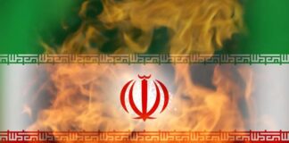 Iranian flag with flames in the background