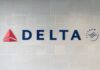 Delta Airlines logo displayed on a wall