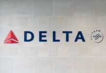 Delta Airlines logo displayed on a wall