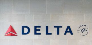 Delta Airlines logo displayed on a wall
