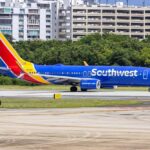 Southwest Airlines airplane taxiing on the runway