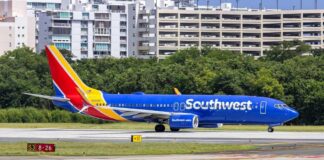 Southwest Airlines airplane taxiing on the runway