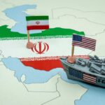 A map of Iran with flags of Iran and the United States and a toy military ship