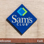 Signage for Sam's Club with welcome and exit indicators
