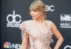 Taylor Swift in ornate dress.