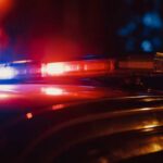 Close-up of a police car's emergency lights at night