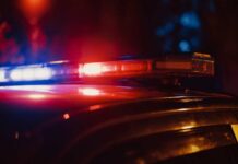 Close-up of a police car's emergency lights at night