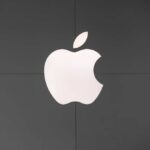 Apple SHOCK Announcement Apple logo displayed on a dark wall