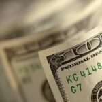 Close-up of a stack of hundred dollar bills