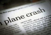 Newspaper headline about a plane crash.