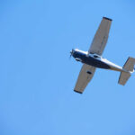 Cessna CRASHES — All Aboard Dead An airplane flying against a clear blue sky