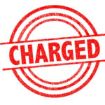 Red charged stamp with circular border