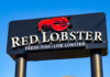 Red Lobster restaurant sign with red lobster logo.