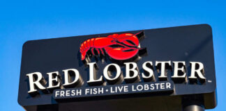 Red Lobster restaurant sign with red lobster logo.