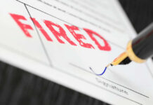 Shockwave: Trump Fired Her! Fountain pen signing document with the word fired