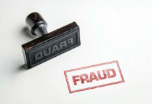 Fraud stamp and red stamped imprint on paper