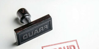 Fraud stamp and red stamped imprint on paper