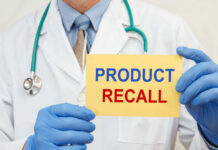 Potato Chips YANKED – Huge Recall Doctor holding a product recall sign in gloves