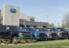 Ford’s Bold Move: Worker-Focused Trucks Unleashed Ford dealership with trucks lined up outside