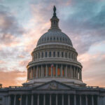 Mysterious Vanishing Act: Rep. Wilson Missing Capitol building under cloudy sunset sky