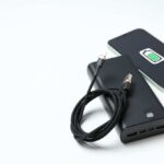 Power Bank Confession Diverts Flight! A portable charger and smartphone with a charging cable