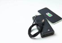 Power Bank Confession Diverts Flight! A portable charger and smartphone with a charging cable