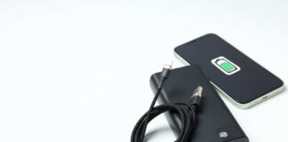 A portable charger and smartphone with a charging cable