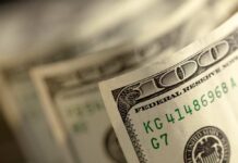 Close-up of a stack of hundred dollar bills