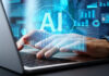 AI’s Shocking Role in FSU Mass Shooting Person typing on laptop with AI hologram